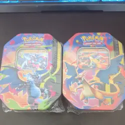 Pokemon TCG - Mega Charizard X ex Tin + Mega Charizard Y ex Tin (Both Sealed) - Image 1