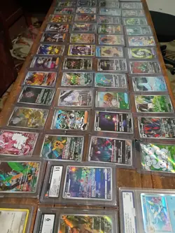Pokemon Card Lot! 55 cards. Graded and ARs and more. Mimikyu. - Image 1