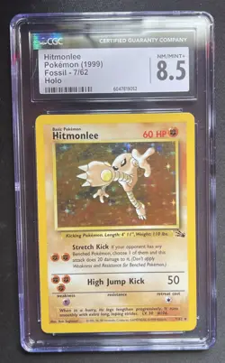 CGC 8.5 NM/MINT+ Hitmonlee 7/62 Fossil Holo Pokemon Card - Image 1
