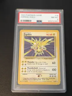 1999 POKEMON TCG BASE SET #16 ZAPDOS-HOLO PSA 8 - Image 1