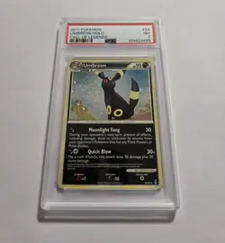 2011 POKEMON UMBREON HOLO (NM) PSA 7 - Image 1