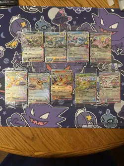 Prismatic Evolutions Surprise Box SEALED STAMPED EX Promos 9 Cards Complete Set - Image 1