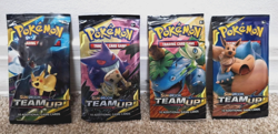 Pokemon Sun and Moon TEAM UP lot of four EMPTY Packs - One of Each Art! - Image 1