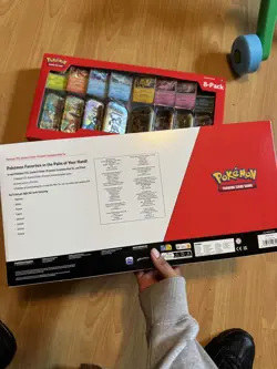 Pokemon TCG: Prismatic Evolutions 8 Mini-Tins Promos Costco - Image 1
