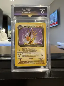 Dark Jolteon 1st Edition 38/82 Team Rocket 2000 GetGraded 8 NM Vintage Pokemon - Image 1