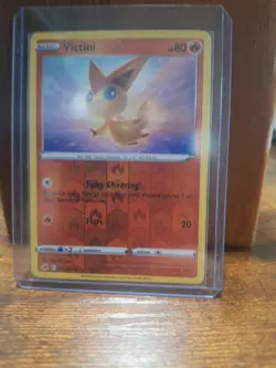 Pokemon Victini Reverse Holo Trading Card Game Collectible 036/264 - Image 1