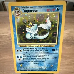 The Pokemon Company Vaporeon 12/64 Jungle Holo Rare 1999 80 HP Stage 1 ENG - Image 1