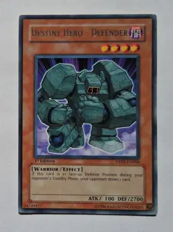 YuGiOh - Destiny Hero Defender - DP05-EN008 1st Edition - Rare - LP - Image 1