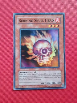Burning Skull Head - WB01-EN003 - Super Rare Unlimited Edition YUGIOH Card - Image 1