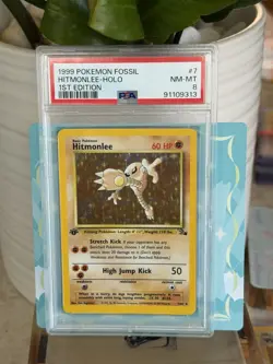 Wizards of the Coast Fossil 1999 Hitmonlee 7/62 Holo Rare 1st Ed PSA 8 - Image 1