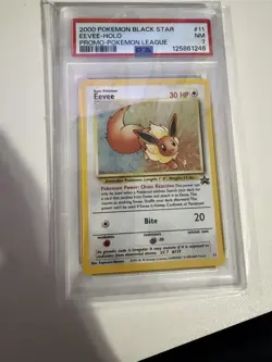 Eevee Holo 11 Pokemon League Promo Black Star Pokemon PSA 7 - Image 1