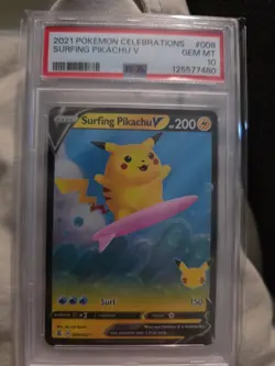 The Pokemon Company Surfing Pikachu V 008/025 Celebrations Holo PSA 10 - Image 1