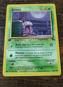 Pokemon Fossil 1st Edition Grimer 48/62 Non Holo NM - Image 1