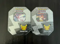 Pokemon - Lance’s Charizard V & Dark Sylveon V Celebration Tin 25th Anniversary - Image 1