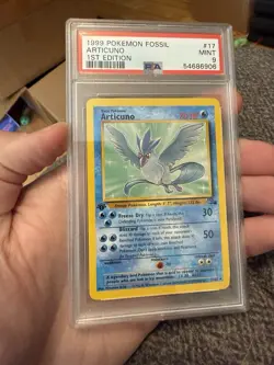 1999 POKEMON FOSSIL 1ST EDITION #17 ARTICUNO PSA 9 - Image 1