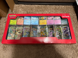 2025 Pokemon Prismatic Evolutions Mini Tins 8-Pack (Costco Exclusive) - Image 1
