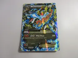 Mega Charizard EX 69/106 Flashfire Pokemon Card Damaged - Image 1