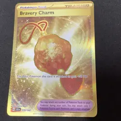 Bravery Charm 175/142 Gold Hyper Rare 2024 Pokemon Stellar Crown Card NM - Image 1