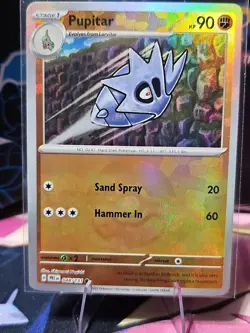 Pokemon TCG Pupitar Master Ball Pattern Holo Card 048/131 Prismatic Evolutions - Image 1