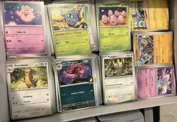 Pokemon card lot. 50 random cards. 10 holos/reverse guaranteed. Mixed sets. - Image 1