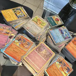 Pokemon card lot. 50 random cards. 10 holos/reverse guaranteed. Mixed sets. - Image 2