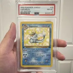 1999 Pokemon TCG Jungle Vaporeon 1st Edition Rare 28/64 PSA 8 Card Stock - Image 1