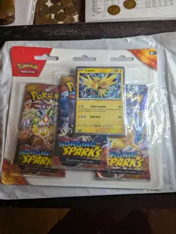 Pokemon TCG: Scarlet & Violet - Surging Sparks 3 Pack Blister Sealed - Image 1