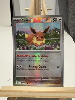 Pokemon TCG Prismatic Evolutions Eevee Masterball Reverse Holo Card 074/131 - Image 1