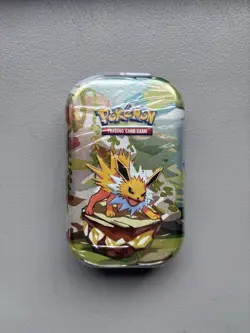 Pokemon TCG Scarlet & Violet Prismatic Evolutions Jolteon Mini Tin Sealed - Image 1