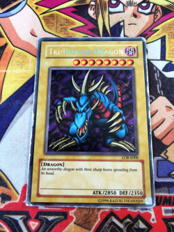 Tri-Horned Dragon lob-e000 Unltd Ed (HP) Secret Rare Yu-Gi-Oh! - Image 1