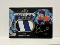 RYAN NUGENT-HOPKINS 2023-24 UPPER DECK ICE SIGNATURE SWATCHES AUTO BLACK /15 NHL - Image 1