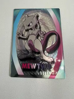 MEWTWO--JAPANESE MEIJI EMBOSSED PROMO FOIL POKEMON CARD - Image 1