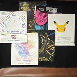 Lot of 6 Pokemon TCG Players Guides: 151, Prismatic Evol., Celebrations + More - Image 1