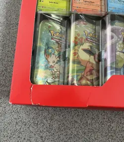 Pokemon TCG Prismatic Evolutions Costco Mini Tins 8 Pack New Sealed Damaged - Image 3