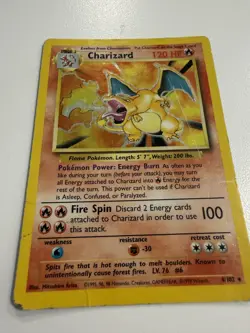 Vintage Damaged Pokemon Cards - including a base set Charizard - Image 1