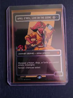 April O'Neil, Live on the Scene (Borderless) (Surge Foil) Commander: Teenage... - Image 1