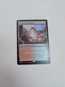 MTG - Commercial District - Murders at Karlov Manor NM/M Condition - Image 1
