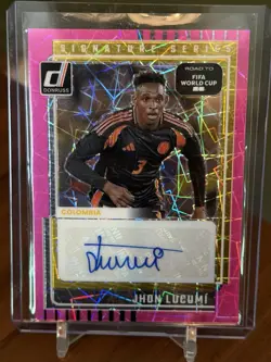 JHON LUCUMI 2025-26 DONRUSS ROAD TO FIFA WORLD CUP AUTOGRAPH PINK VELOCITY AUTO - Image 1