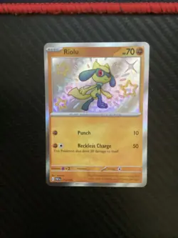 Pokemon Riolu Shiny Rare SV: Paldean Fates 173/091 NM - Image 1