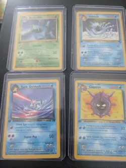 Lot of 4 1st edition fossil and Team Rocket pokemon cards + 1 free mystery card - Image 1
