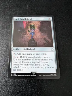 Luck Bobblehead - 135 - NM - Universes Beyond: Fallout - MTG - Image 1
