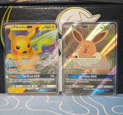 2019 Pokemon TCG Pikachu GX SM232 & Eevee GX SM233 SM Black Star Promo NM+ - Image 1