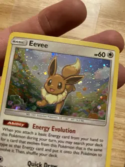 Pokemon Eevee TCG Sun and Moon Base Set Holo Card 101/149 Cosmos Swirl Rare - Image 4