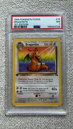 1999 POKEMON FOSSIL 1ST EDITION #19/62 DRAGONITE PSA 7 - Image 1