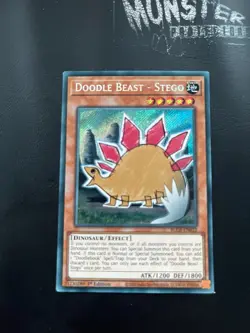 YUGIOH DOODLE BEAST - STEGO SECRET RARE BLCR-EN032 1ST EDITION - Image 1