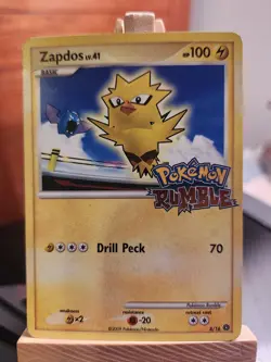 Zapdos 8/16 Rumble Promo Holo Stamp Pokemon TCG Card. - Image 1