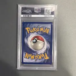 1999 POKEMON FOSSIL 1ST EDITION #60 GAMBLER PSA 9 - Image 2