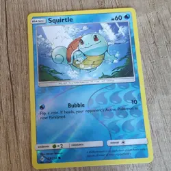 Pokemon TCG Card, Squirtle Unbroken Bonds 33/214 Reverse Holo 2019 - Image 1