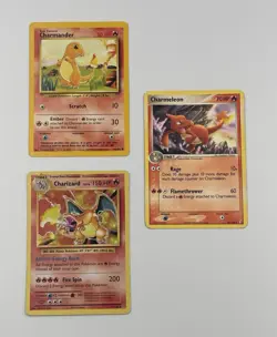 Pokemon Iconic Bundle - Charmander + Charmeleon + Charizard Lot of (3) Cards - Image 1