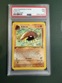 1999 POKEMON FOSSIL 1ST EDITION #50 KABUTO PSA 7 - Image 1